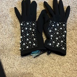 Black and pearl women’s dress gloves.
